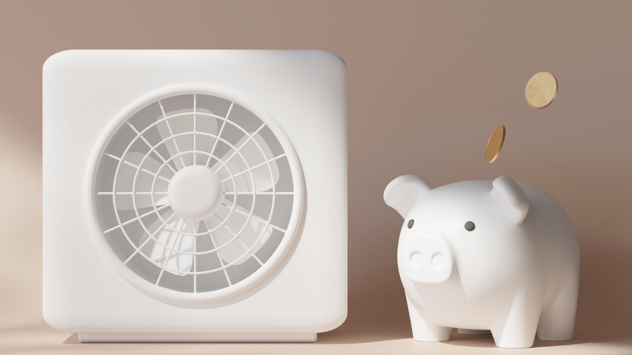 Tirelire placée à côté d'une thermopompe