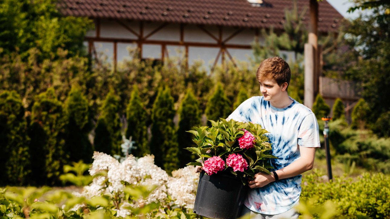 Teenager working as a landscaper